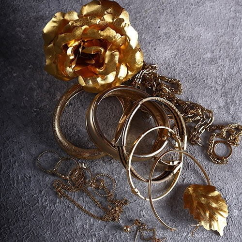 Collection of unwanted jewellery pieces ready for professional valuation assessment in Hatton Garden London