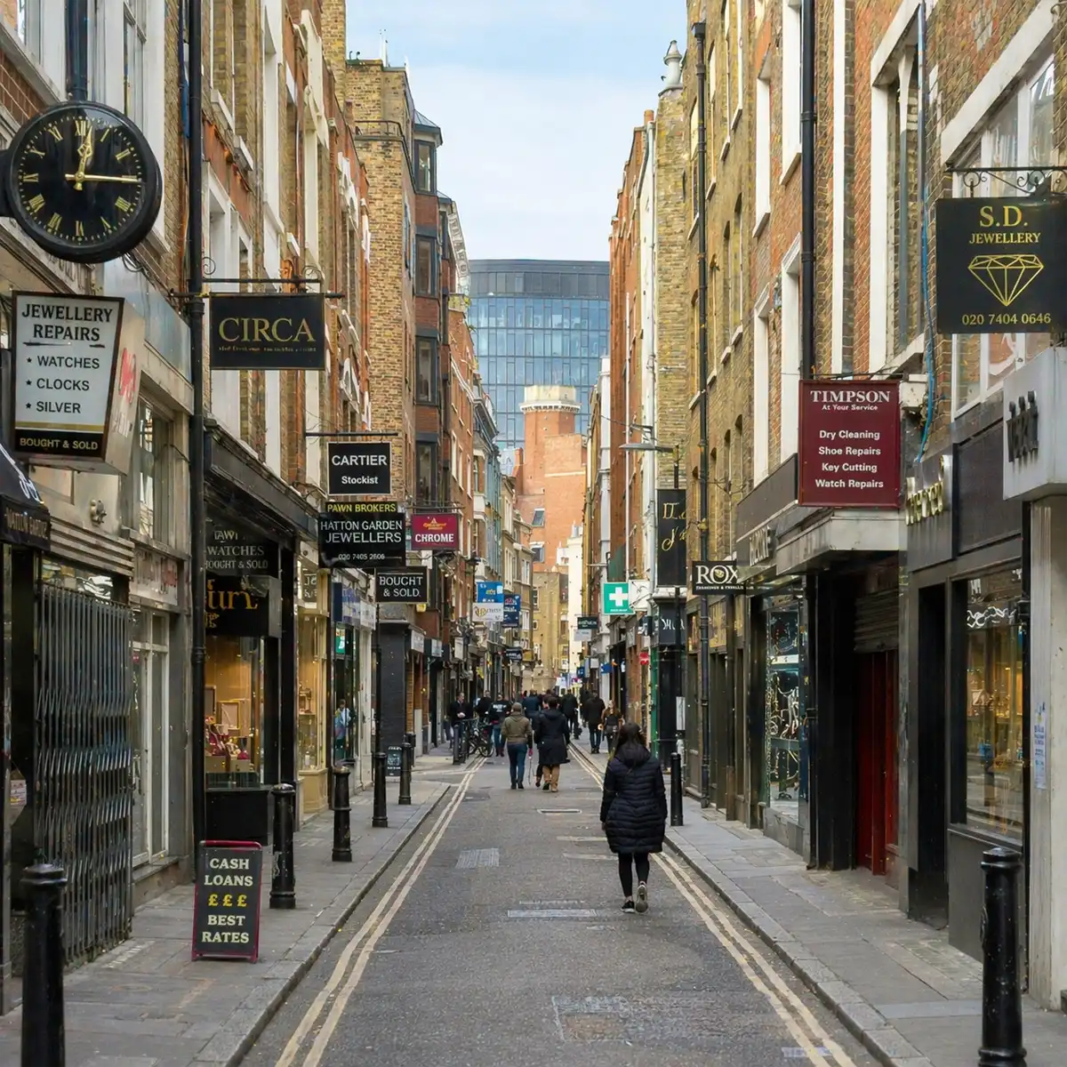 Historic Hatton Garden street view showing traditional jewellery shops where visitors come to buy engagement rings