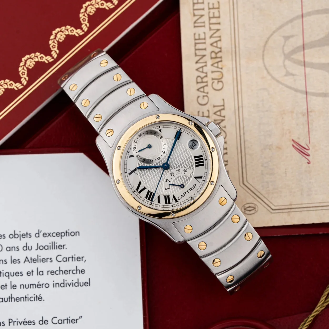 Two tone wristwatch with certification at Brothers and Bezels, Hatton Garden