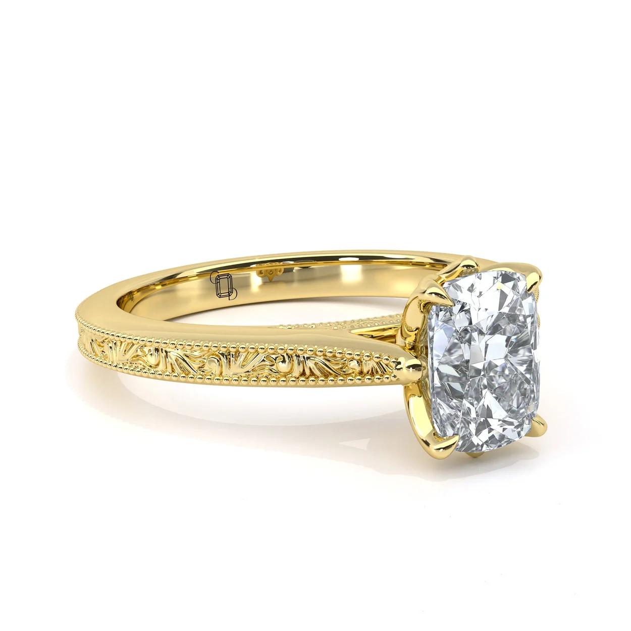 Cushion cut diamond solitaire with engraved band at Clarity Diamonds by Aimee, 67 Hatton Garden