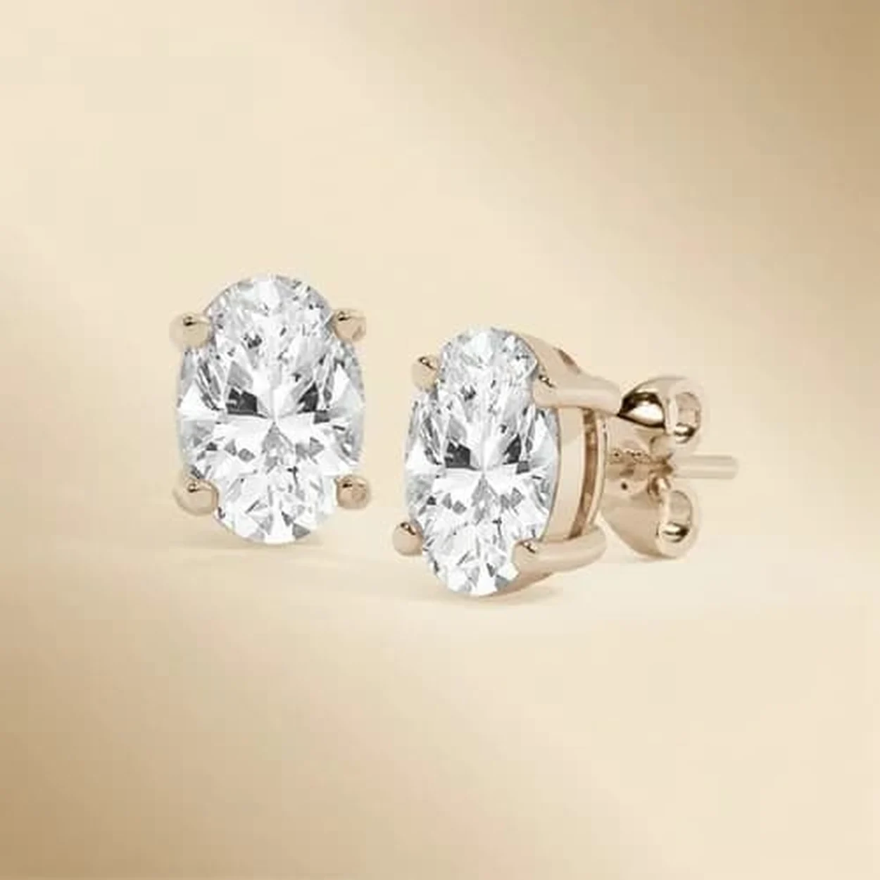 Oval diamond stud earrings at Deluxe Diamond, 88-90 Hatton Garden