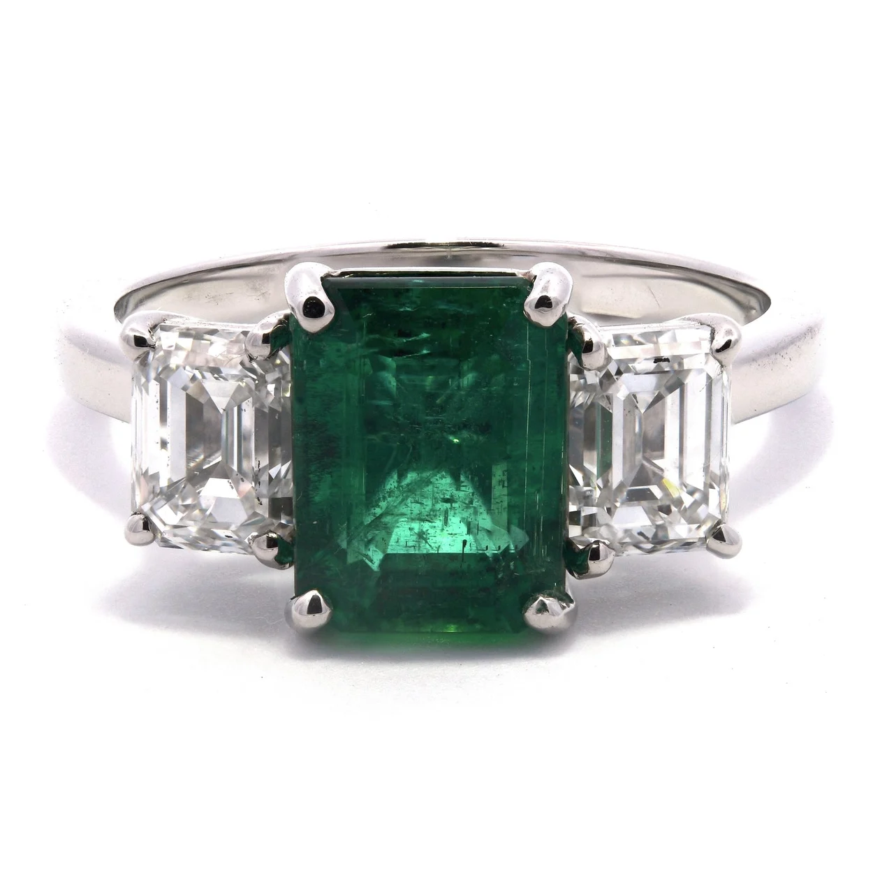 Emerald and diamond three stone ring at Dicky Diamonds, Hatton Garden